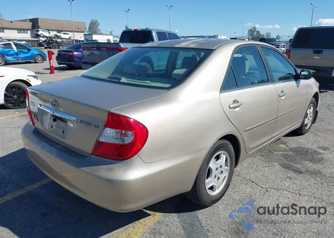 2002 Toyota Camry Le from USA, damaged, VIN JTDBE32K720052674